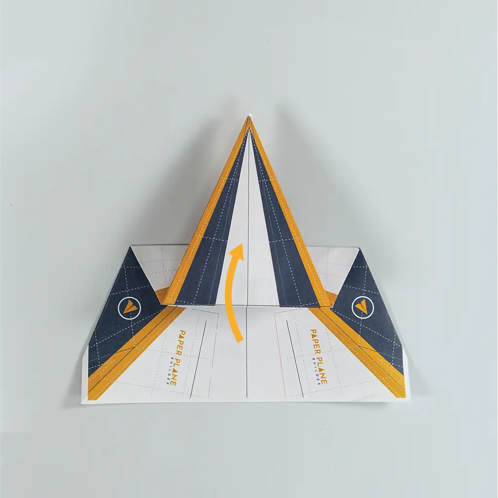 Fold the newly created section away from you to create the nose