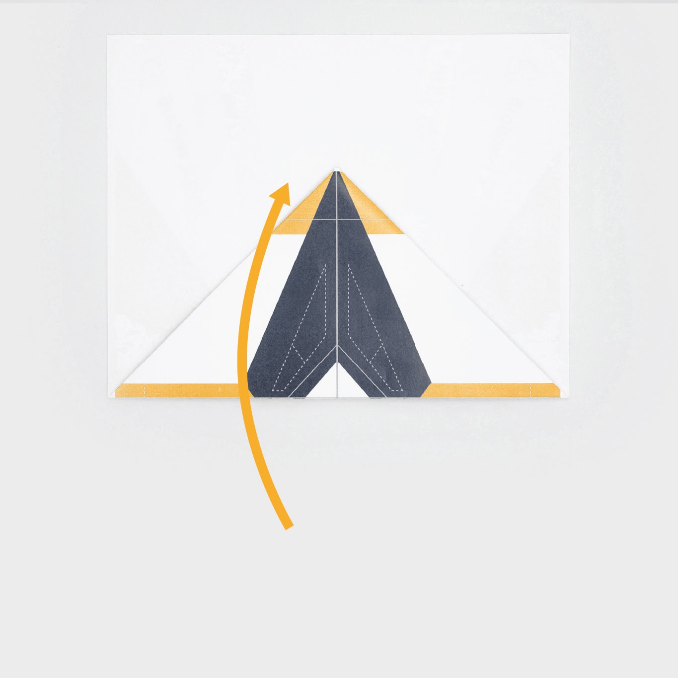 Carefully fold the point of the paper air plane away from yourself.
