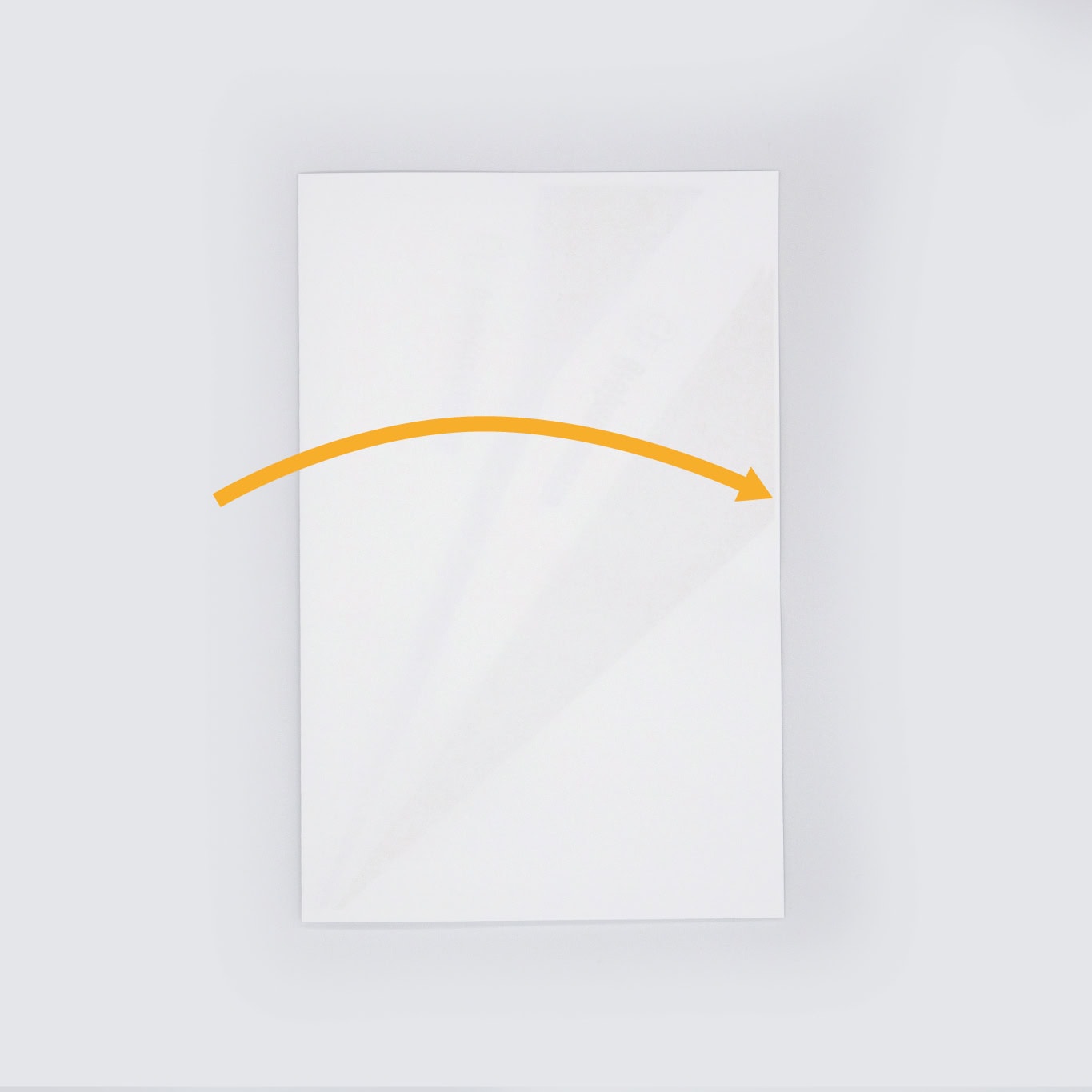 Next, fold the page in half from from left to right.