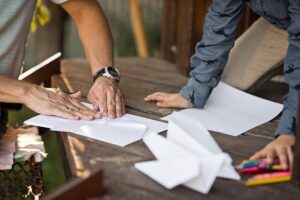 Family using Paper airplane competitions, games, pdf templates and coloring sheets.
