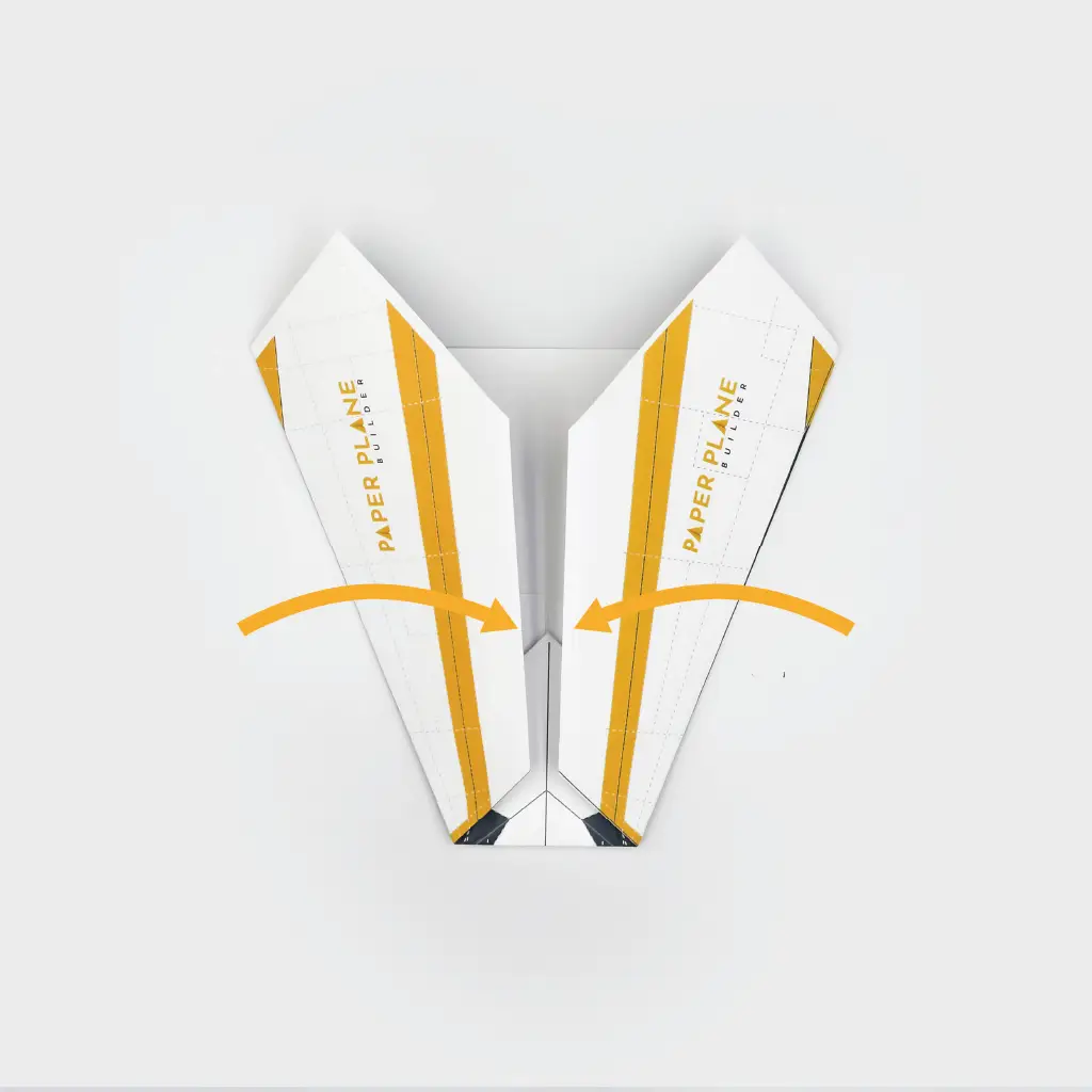 After folding the tip inwards, fold both sides inward until the edges meet in the middle creating the wings.