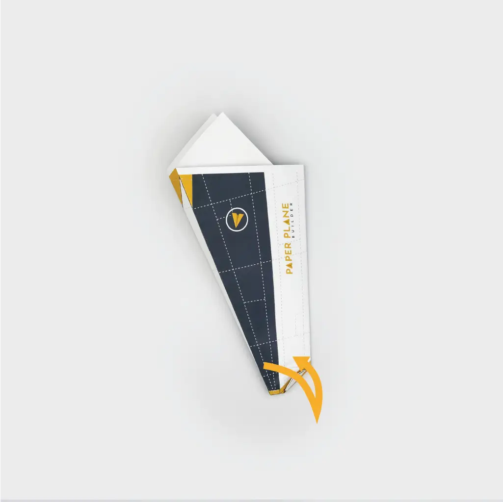 Fold the nose of the plane from side to side, creating a crease.