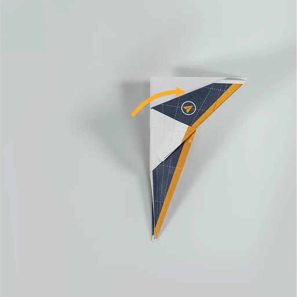 Fold the plane in half to create the fuselage.