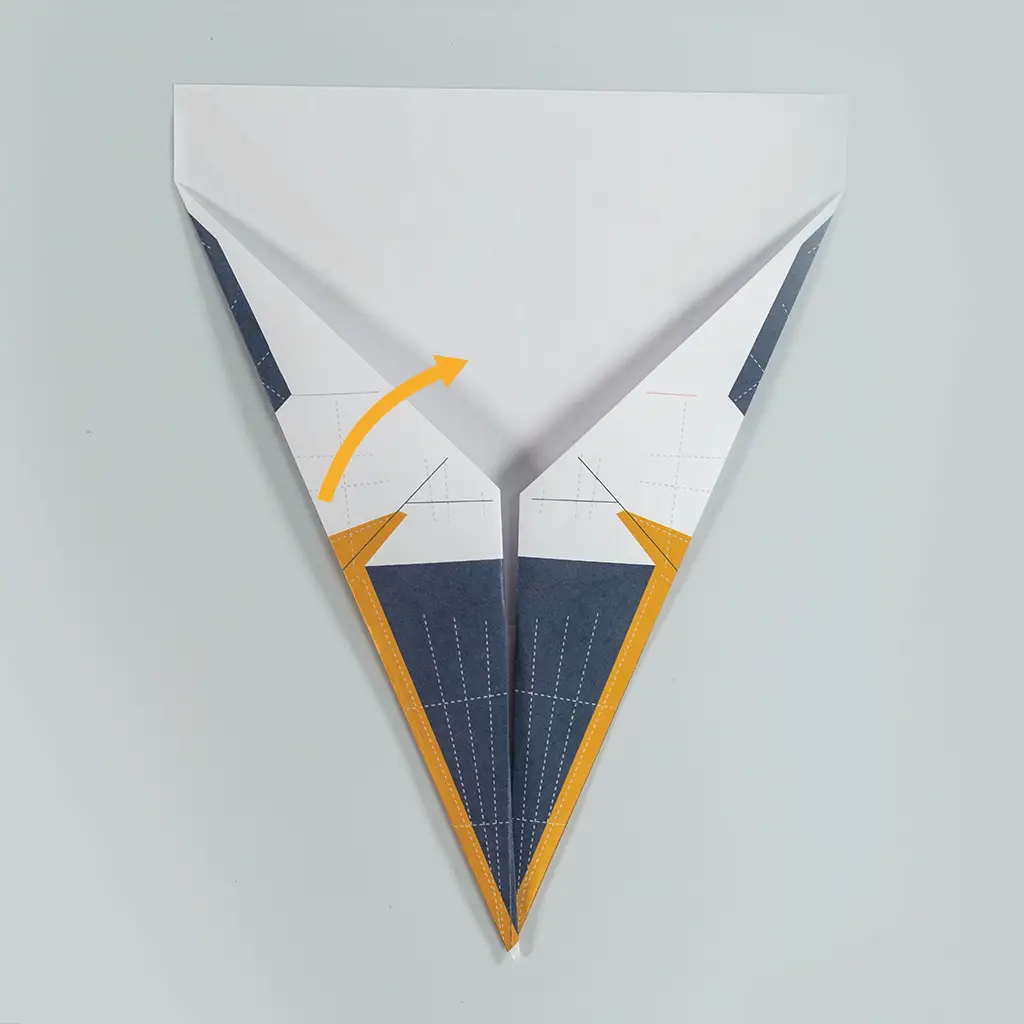 Fold the newly created bottom corners inward to meet in the middle.