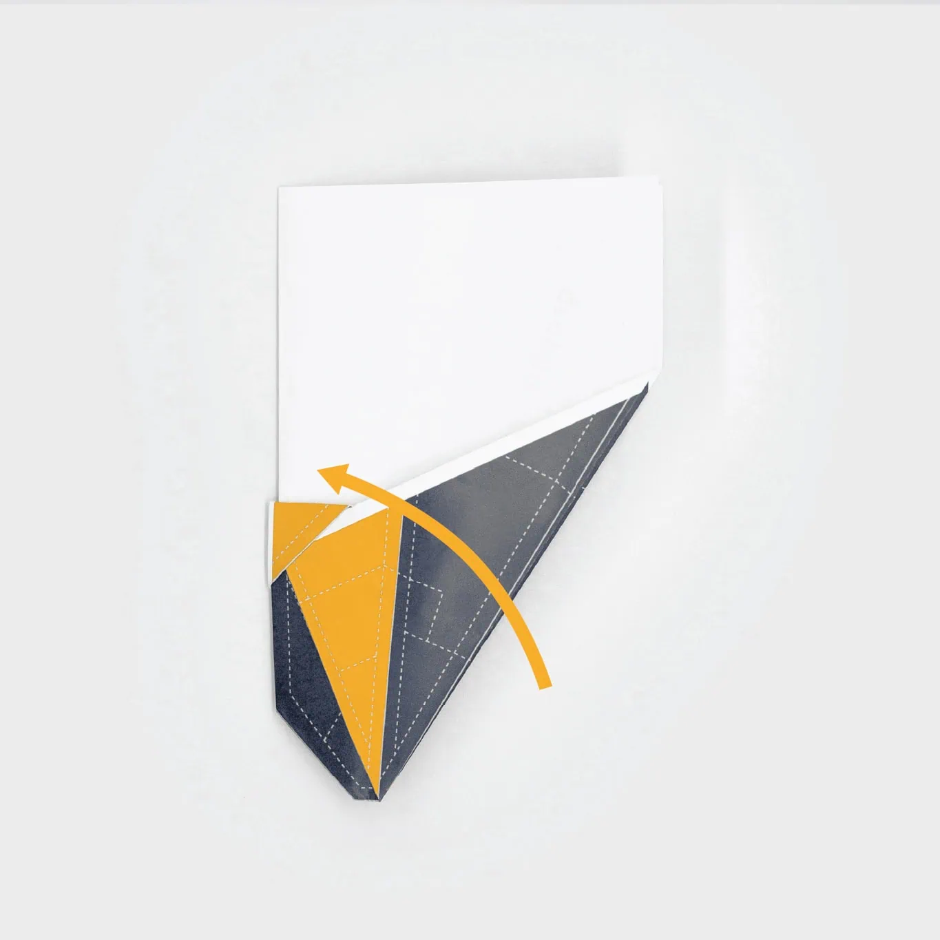 Make the first wing folds so that both sides can be tucked inside the bottom flap.