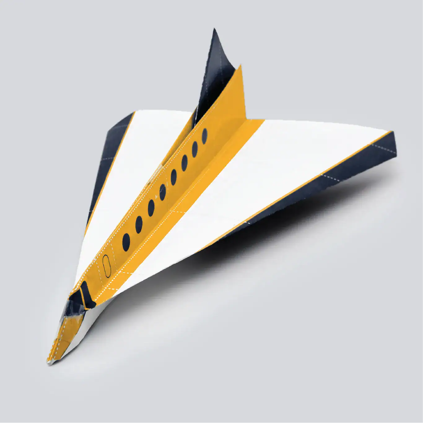 Finally add a small piece of tape to the top, nose, and bottom of the plane.