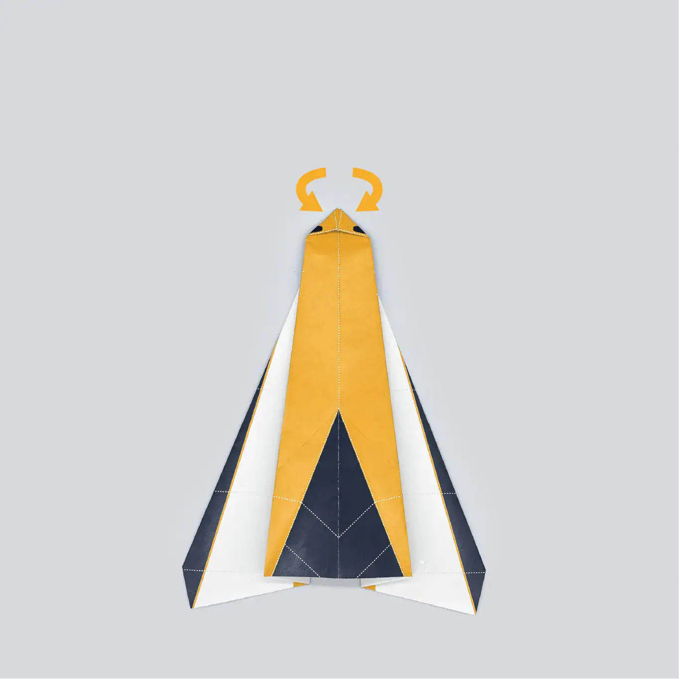 To create the cockpit, fold each corner of the nose of the plane inward to meet in the middle.