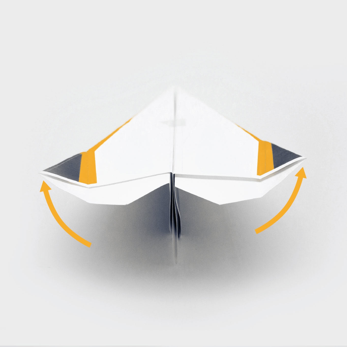 Fold the wing tips up slightly.