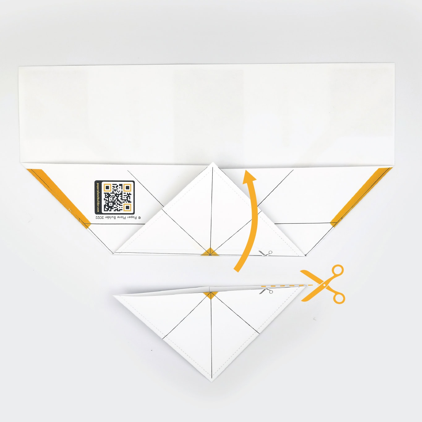 Fold the nose up until it meets the edge of the first two folds, or (optionally) cut the nose off using the provided cut line.