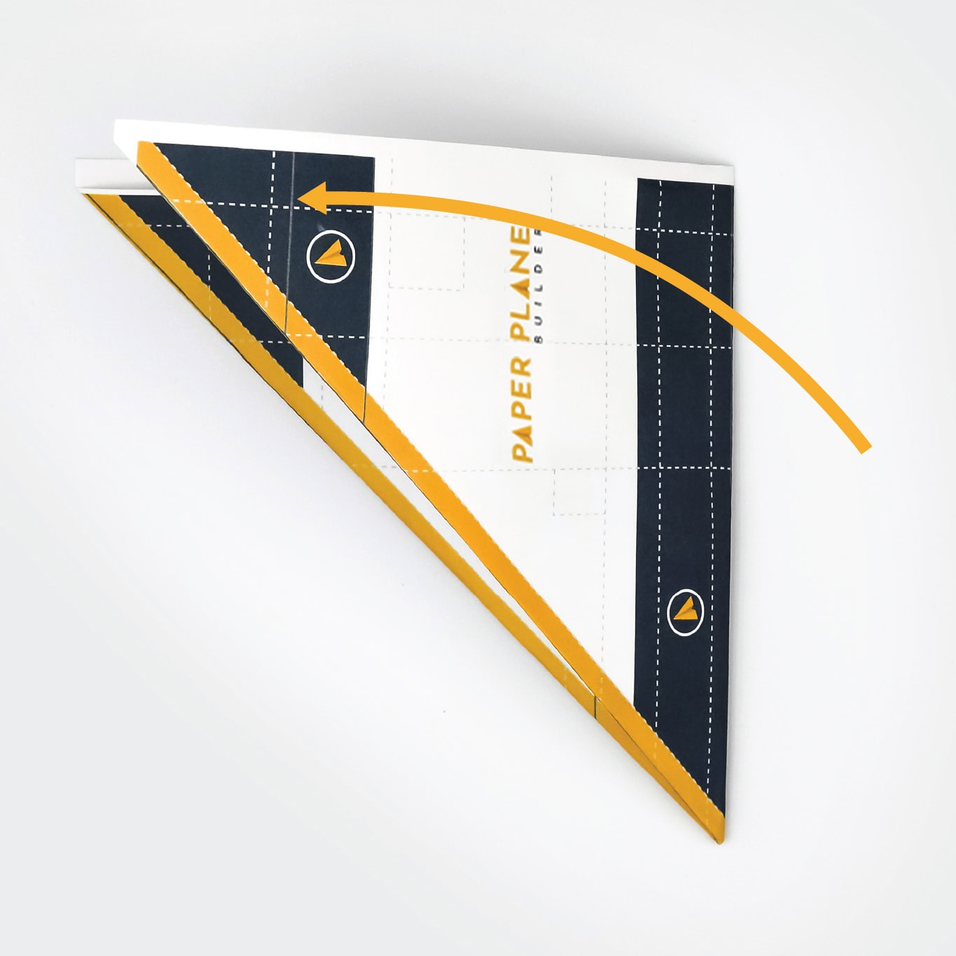 Fold the page in half to create the fuselage.